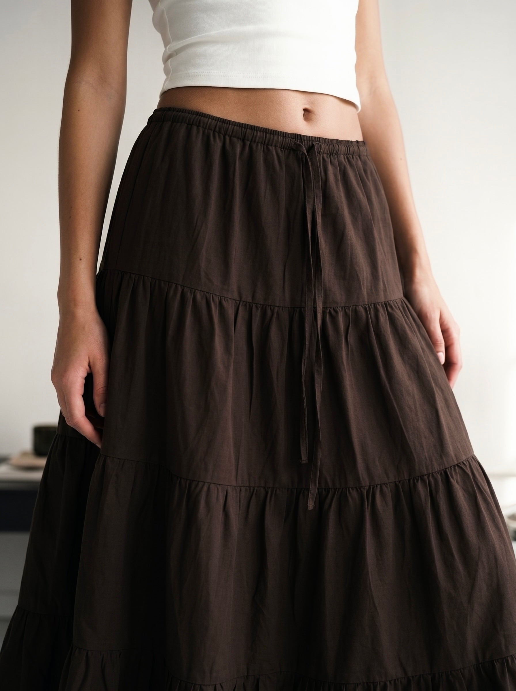 LONG RUFFLE SKIRT IN DARK BROWN
